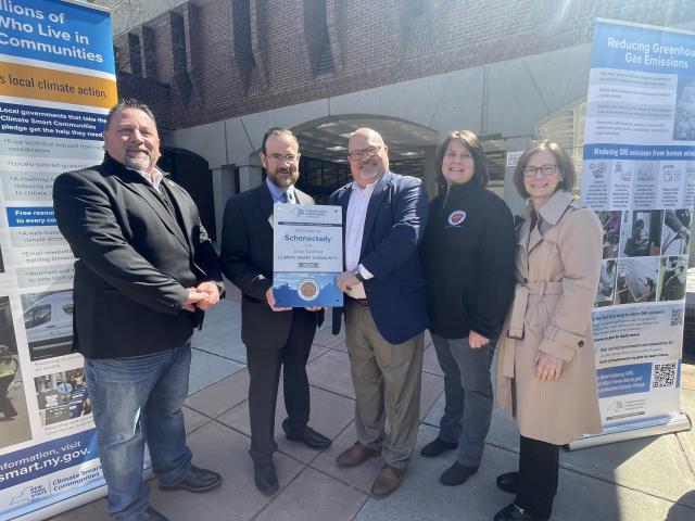 County Legislators with DEC Interim Commissioner with Schenectady County's Plaque Designating it a Silver Certified Climate Smart Community